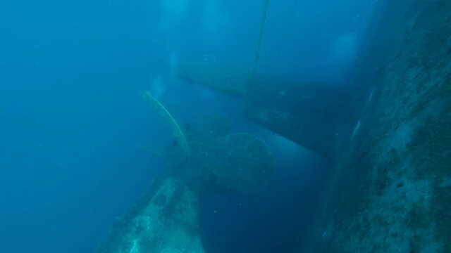 Ship propeller on the shipwreck Swedish ferry MS Zenobia. Slow motion, Wreck diving. Mediterranean sea, Cyprus
