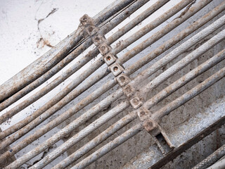 Electrical conduits and air ducts on the wall. Metal conduit with dust