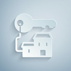 Paper cut Winning house with key icon isolated on grey background. Paper art style. Vector