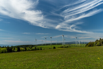 Fototapeta na wymiar wind turbine set in the beautiful landscape of the Czech Republic