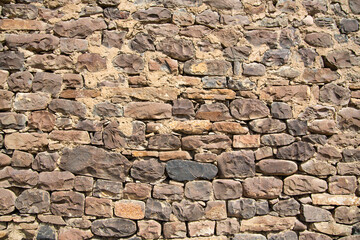 Wall made of river stones fastened with lime mortar