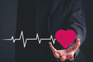 Health care, organ donation, life insurance, world heart day, world health day concept. Hand...