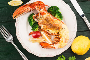 Lobster Thermidor, grilled lobster stuffed with cream and cheese, served with lemon，Boston...