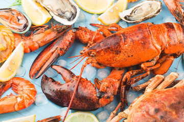 Seafood dinner, seafood dinner with fresh lobster, crab, mussel and oyster as background