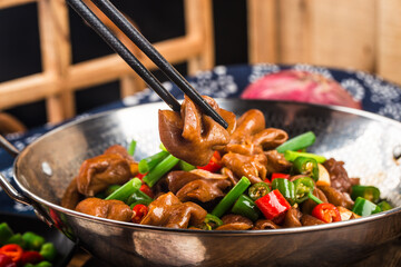 Chinese Cuisine: Spicy pig sausage dry pot