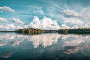 Beautiful landscape. Wallpaper. Clouds are reflected in the water
