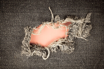 Torn denim vintage texture background.