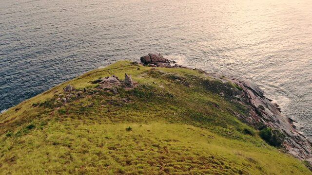 Green hill with horizon in tropical sea on coastline at Krating cape
