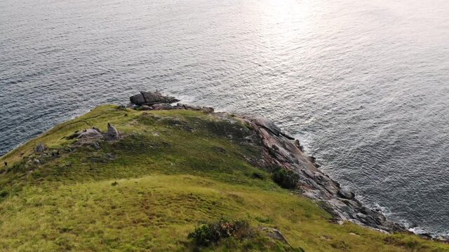 Green hill with horizon in tropical sea on coastline at Krating cape