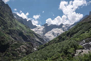 Fototapeta na wymiar mountains gorge glacier rocks clouds