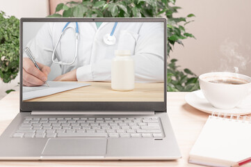 Doctor Writing Prescription on laptop screen. Doctor consulting patient by online video call on laptop screen. Online consultation, Virtual hospital and online therapy.