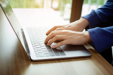Closeup female working remotely at home, Man typing on laptop or computer