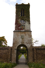 Old clock tower in St. Anne's park, Raheny, Dublin, Ireland, on overcast day