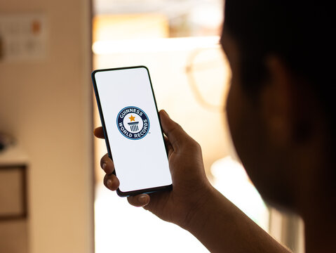 Assam, India - April 10, 2021 : Guinness World Records Logo On Phone Screen Stock Image.