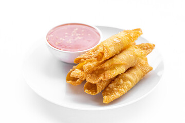 Fried pork wontons with  sauce.