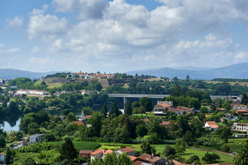 Fototapeta na wymiar view of Valença with its fortress at the top from the Tui cathedral