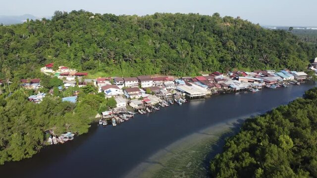 Aerial view fly over Sungai Jawi river at Bukit Tambun fishing village