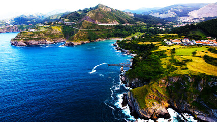 Obraz premium In this imagen you can see Castro Urdiales, and dicido´s charger. This charger is ubicated in the cliffs of the town. Castro Urdiales is a city ubicated in Cantabria, Spain. 