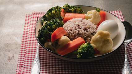 Purple rice in dish with vegetables and egg, Healthy eating, Diet food concept.