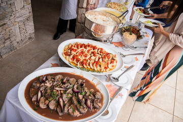 Dinner made in Brazil. Meat, rice, farofa, salad
