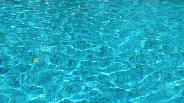 tranquil water in a pool , slow motion