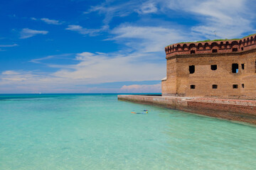 The crystal clear waters of the Gulf of Mexico surround Civil War Historic Fort Jefferson in the Dry Tortugas makes a great place for swimming and snorkeling