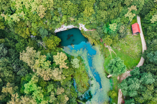 Spring, lake, river and waterfall at Izvir reke Krupe, Slovenia