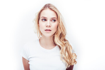 Naklejka premium young pretty stylish blond hipster girl posing emotional isolated on white background happy smiling cool smile, lifestyle people concept