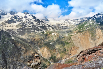 Fototapeta na wymiar view of the Caucasus mountains and peaks covered with snow
