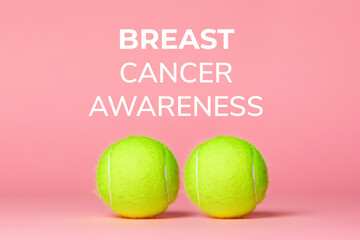 Two light green tennis balls on a pink background. Close up. Breast Cancer Awareness Month concept