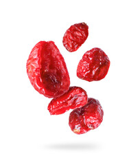 Dried cranberries close up in the air on a white background