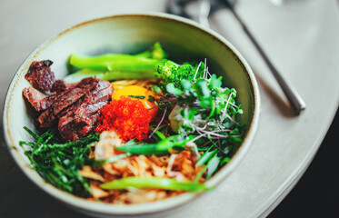 No Broth Mazemen Ramen with beef and Vegetables and caviar in bowl