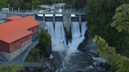 Naklejka premium hydroelectricity turbine energy generator power plant waterfalls hydroelectric dam in Sherbrooke Quebec Canada