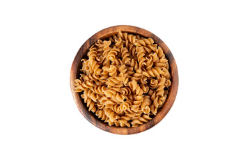 Bowl of wholegrain pasta spirals or fusilli, isolated on white background