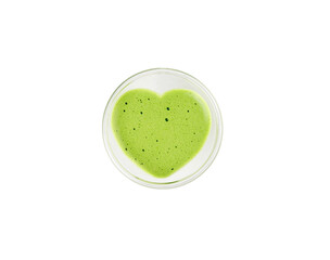 Heart shaped cup of green matcha latte tea isolated on white