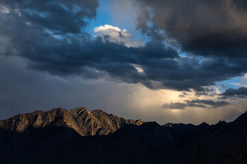Sunset dramatic sky in Karakorum mountains . 