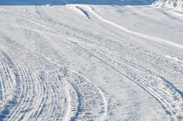 Fototapeta na wymiar Tracks in the Snow
