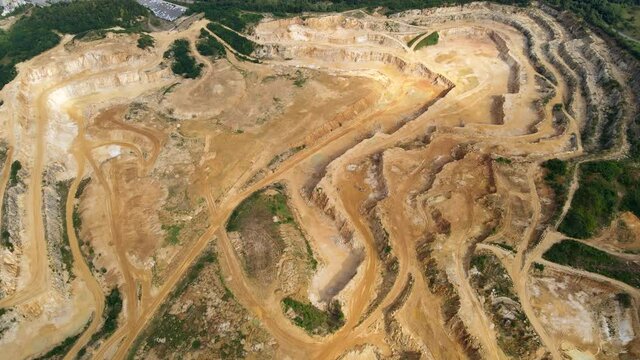 Aerial of a chalk / lime quarry in Germany, drone view of stone pit in 4k