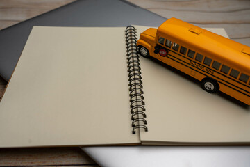 School bus on the Book. Composition school bus model and Note book, Draw and write. Back to School...