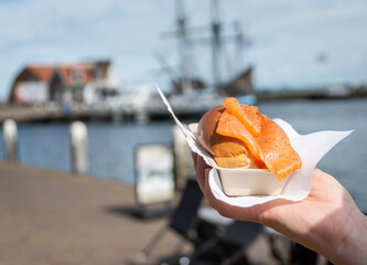 Portion of salmon sandwich sold in The Netherlands as a street snack food and called broodje zalm (in dutch)