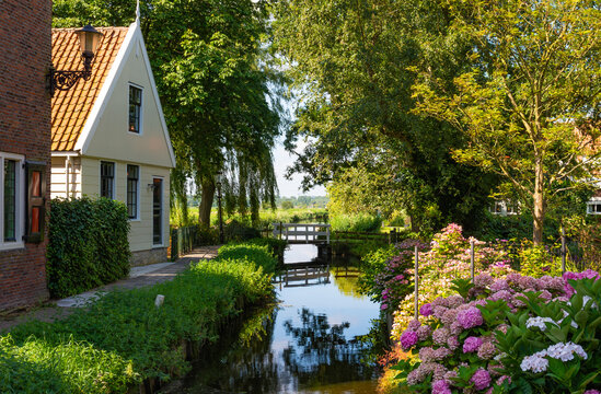 Scenery with canal in Ransdorp village, which is a part of the borough Amsterdam-Noord