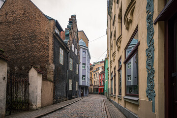 A small street in an old  Riga town at winter evening