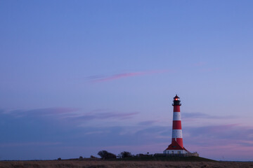 Westerhever lighthouse, salt marshes, North Sea