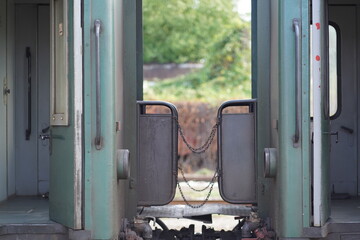 Green wagons on the narrow gauge line Septemvri - Dobrinishte in Bulgaria