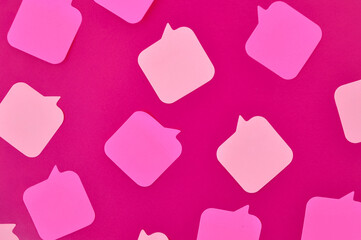 pink message stickers on crimson background