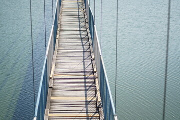 Rope bridge over a large river - the only road for the inhabitants of the village of Lisitsite...