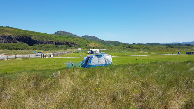View from sand dunes over camp site to Snowdonia National Park, a lovely relaxing and quiet place to take a stay cation , when going abroad is not permitted.