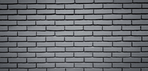 Gray or grey brick wall background. Grunge cement painted wallpaper. Block exterior and Retro, Loft or Vintage built style in black and white tone or monochrome.