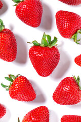 Bright red strawberries on a white background