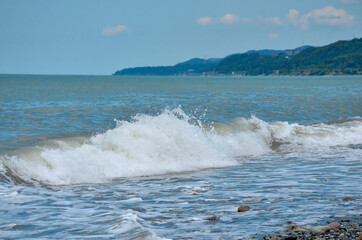 Surf on the beach in Loo, Russia